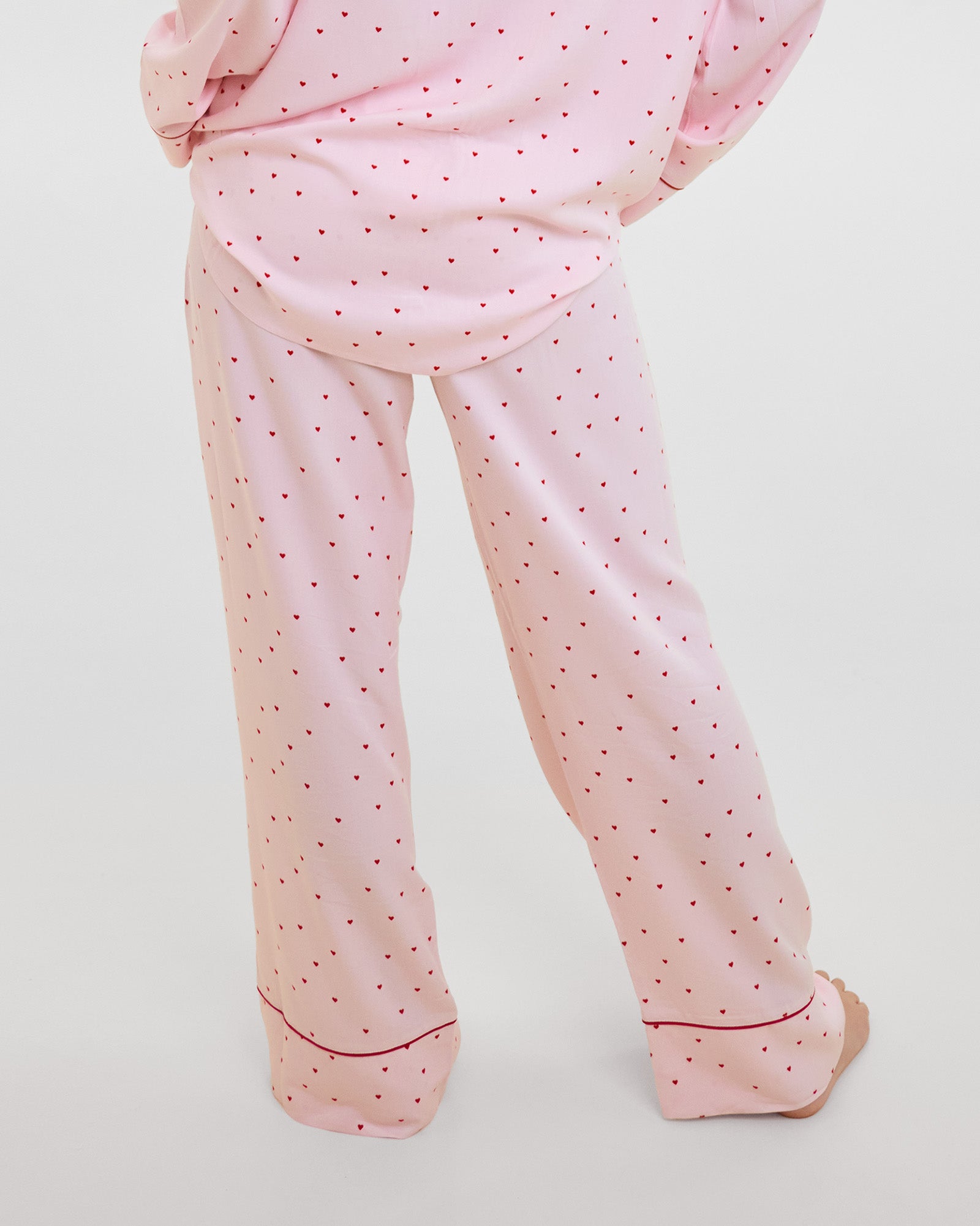 Model wears Hearts In Cabana Long Pj Pant in MINI HEART PRINT. On body back view
