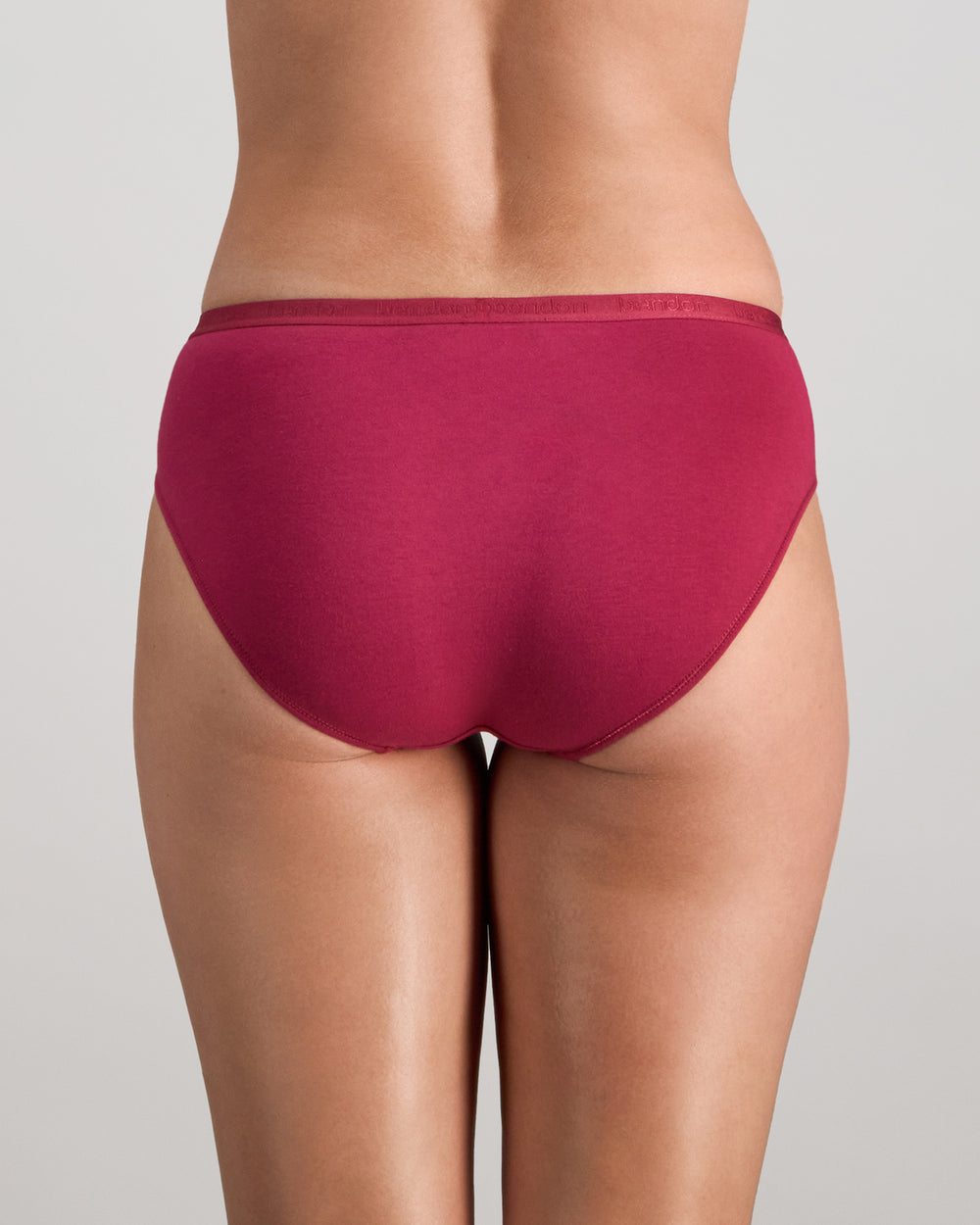 Model wears Body Cotton Bikini in BEAUJOLAIS. On body back view
