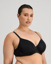 Model wears Sculpt Contour Bra in BLACK. On body side view