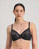 Model wears Yvette Underwire Bra in BLACK. On body front view
