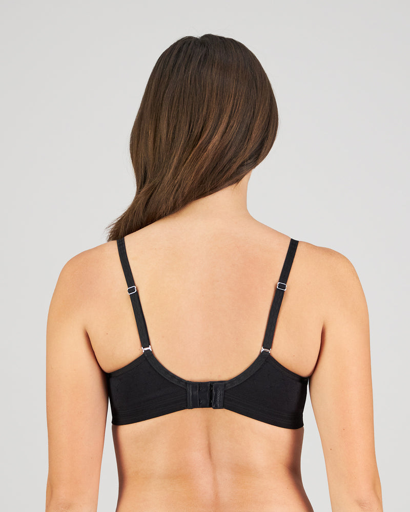 Model wears Bendon Body Lace Wire Free Bra in BLACK. On body back view