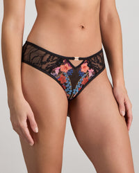 Model wears Adaline Brazilian in BLACK FLORAL PRINT. On body side view