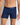 Model wears Bamboo Mens Trunk in Medieval Blue. On body front view