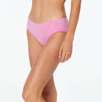 Model wears Simply Seamless Boyshort in SHOCKING PINK MARLE. On body front view