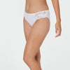 Model wears Body Lace High Cut Brief in WHITE. On body side view