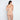 Model wears Medium Control Bodysuit in CARAMEL. On body back view