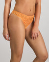 Model wears My Fit Underlayer Thong in TANGERINE. On body side view