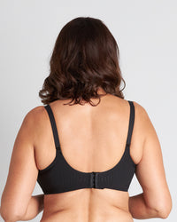 Model wears Comfit Collection Contour Bra in BLACK. On body back view