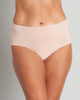 Model wears Au Naturel Full Brief in LATTE. On body front view