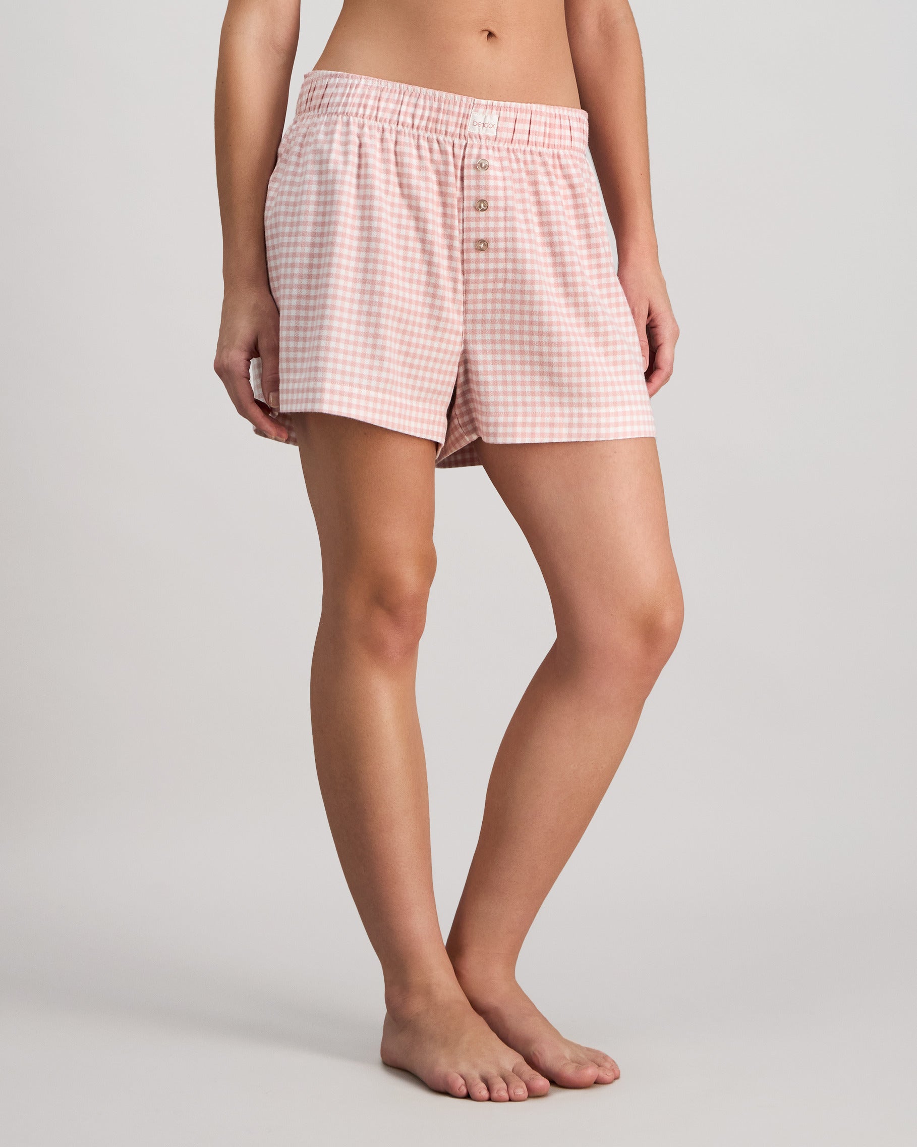 Model wears Cosy Flannel Short in ROSE MINI GINGHAM. On body side view