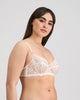 Model wears Sofia Underwire Bra in CAMEO. On body side view