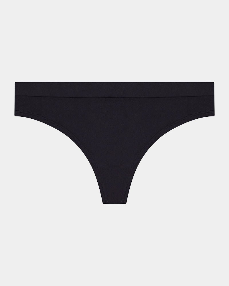 Seamless Soft Thong in BLACK. Flat lay front view