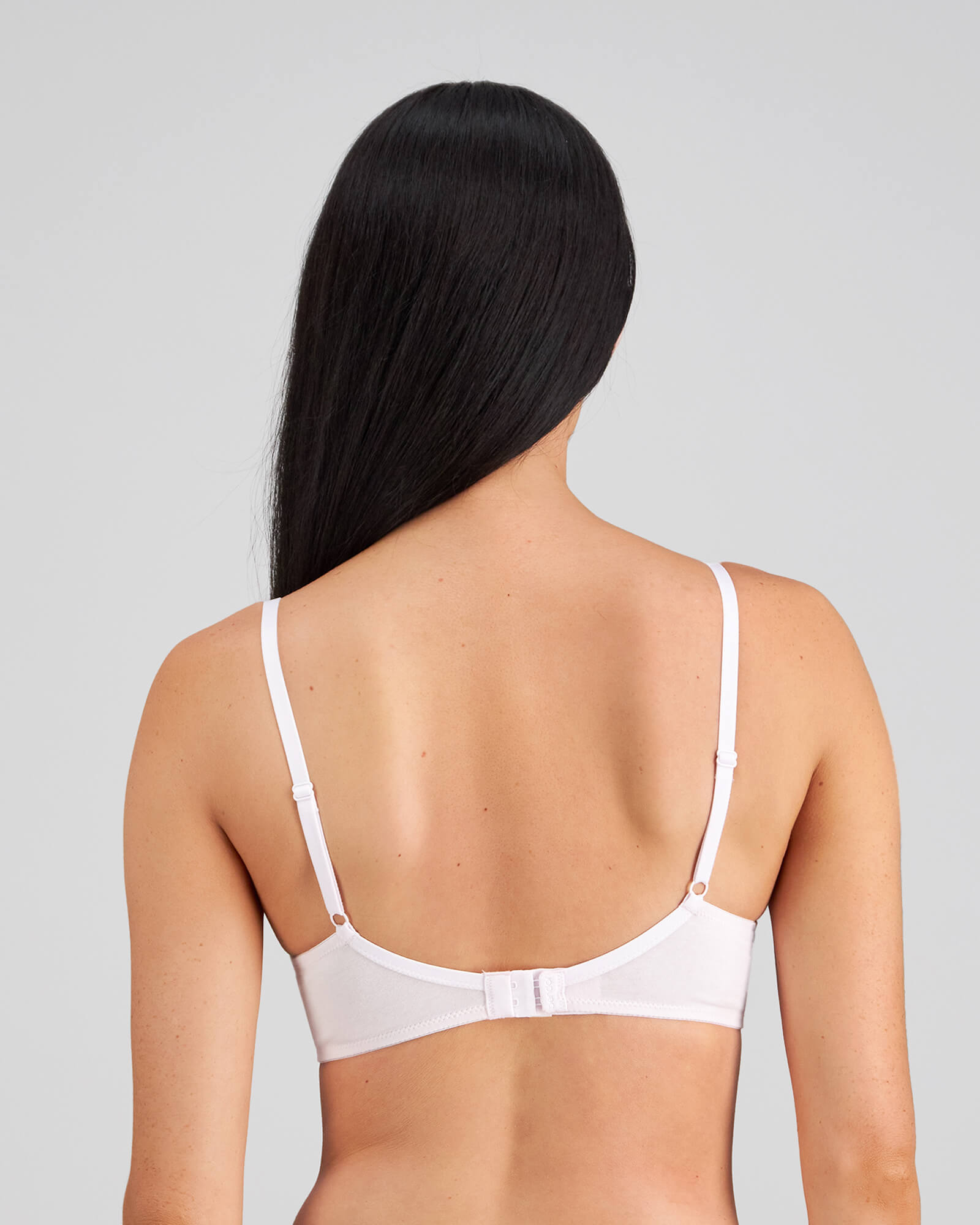 Model wears Embrace Contour Bra in FESTIVAL BLOOM. On body back view