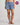 Model wears Cosy Flannel Short in BLUE CHECK. On body front view