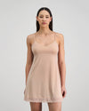 Model wears Understatement Slip in LATTE. On body front view