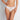 Model wears Sofia Thong in BRIGHT WHITE. On body front view