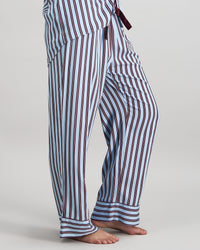 Model wears Cabana Stripe Long Pj Pant in COOL BLUE. On body side view