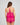 Model wears Eva Jean Camisole in FANTASY FUCHSIA. On body back view