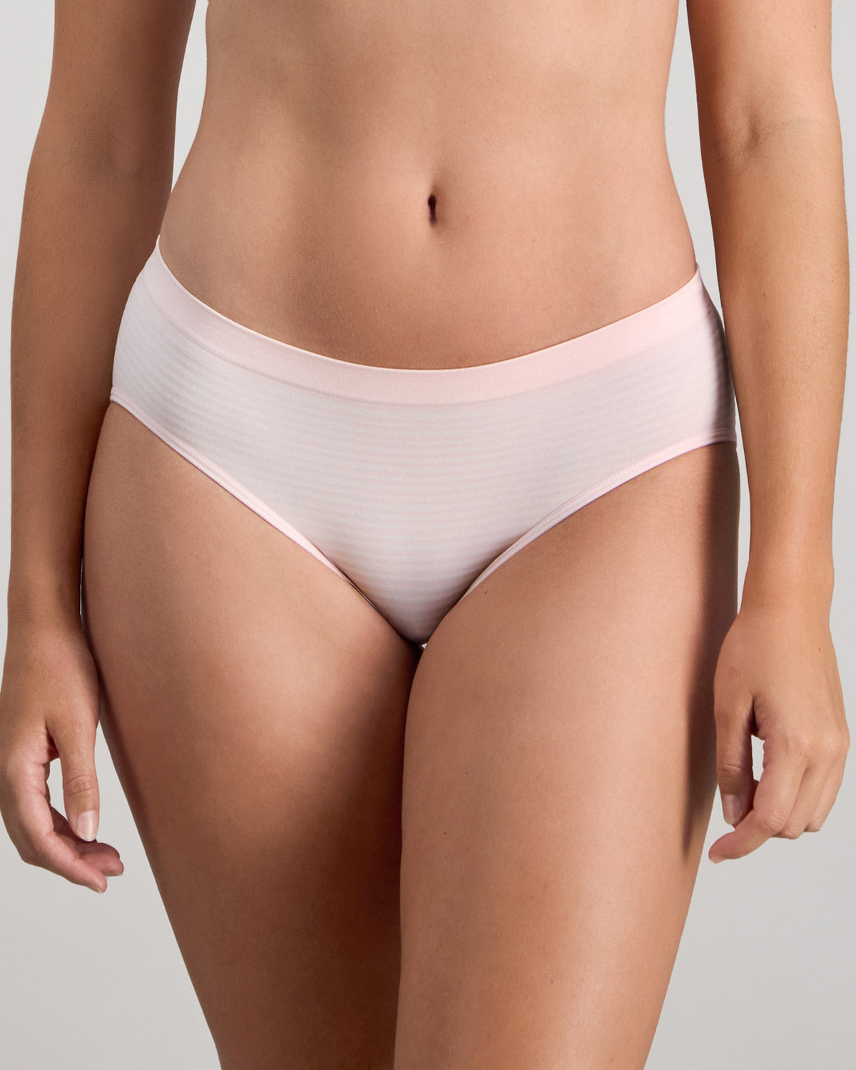 Model wears Simply Seamless Boyshort in ICY PINK/WHITE STRIPE. On body front view
