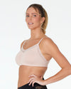 Model wears Bendon Nurture Maternity Bra in LATTE. On body side view