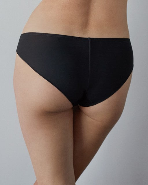 Model wears Naturally Me Bikini in BLACK. On body back view