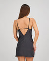 Model wears Romilly Chemise in BLACK. On body back view