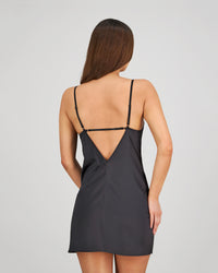 Model wears Romilly Chemise in BLACK. On body back view