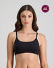 Model wears Extra-Ordinary Crop Top in BLACK. On body front view