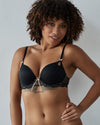 Model wears Keyhole Push Up Bra in BLACK/TOASTED ALMOND. On body front view