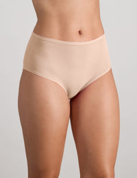 Model wears Extra-Ordinary Full Brief in LATTE. On body side view