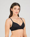 Model wears Bendon Body Lace Wire Free Bra in BLACK. On body side view
