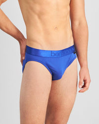 Model wears Bamboo Mens Brief in Surf The Web. On body side view