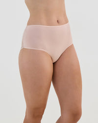 Model wears Cotton And Lace Full Brief in LATTE. On body side view