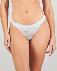 Model wears My Fit Lace Thong in OMPHALODES. On body front view