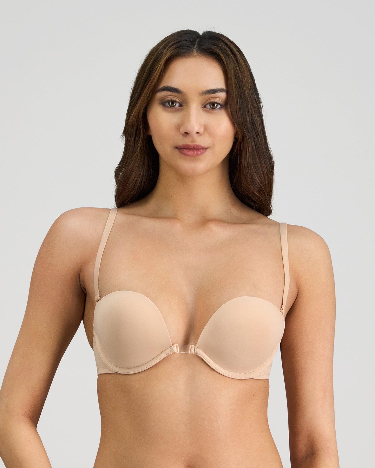 Model wears Infinity Multiway Convertible Bra in LATTE. On body front view