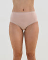 Model wears Stretch Cotton Full Brief in LATTE. On body front view