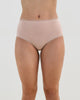 Model wears Stretch Cotton Full Brief in LATTE. On body front view