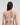 Model wears Comfit Collection Wire Free Bra in SKYWAY. On body back view