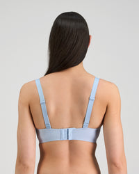 Model wears Comfit Collection Wire Free Bra in SKYWAY. On body back view