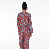 Model wears Marguerite Long Sleeve PJ Top in SAPPHIRE FLORAL PRINT. On body back view