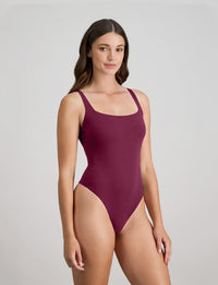 Model wears Extra-Ordinary Bodysuit in FIG. On body side view