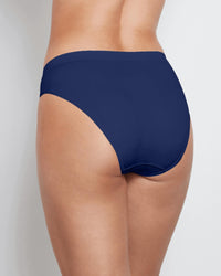Model wears Seamless Soft High Cut Brief in Medieval Blue. On body back view