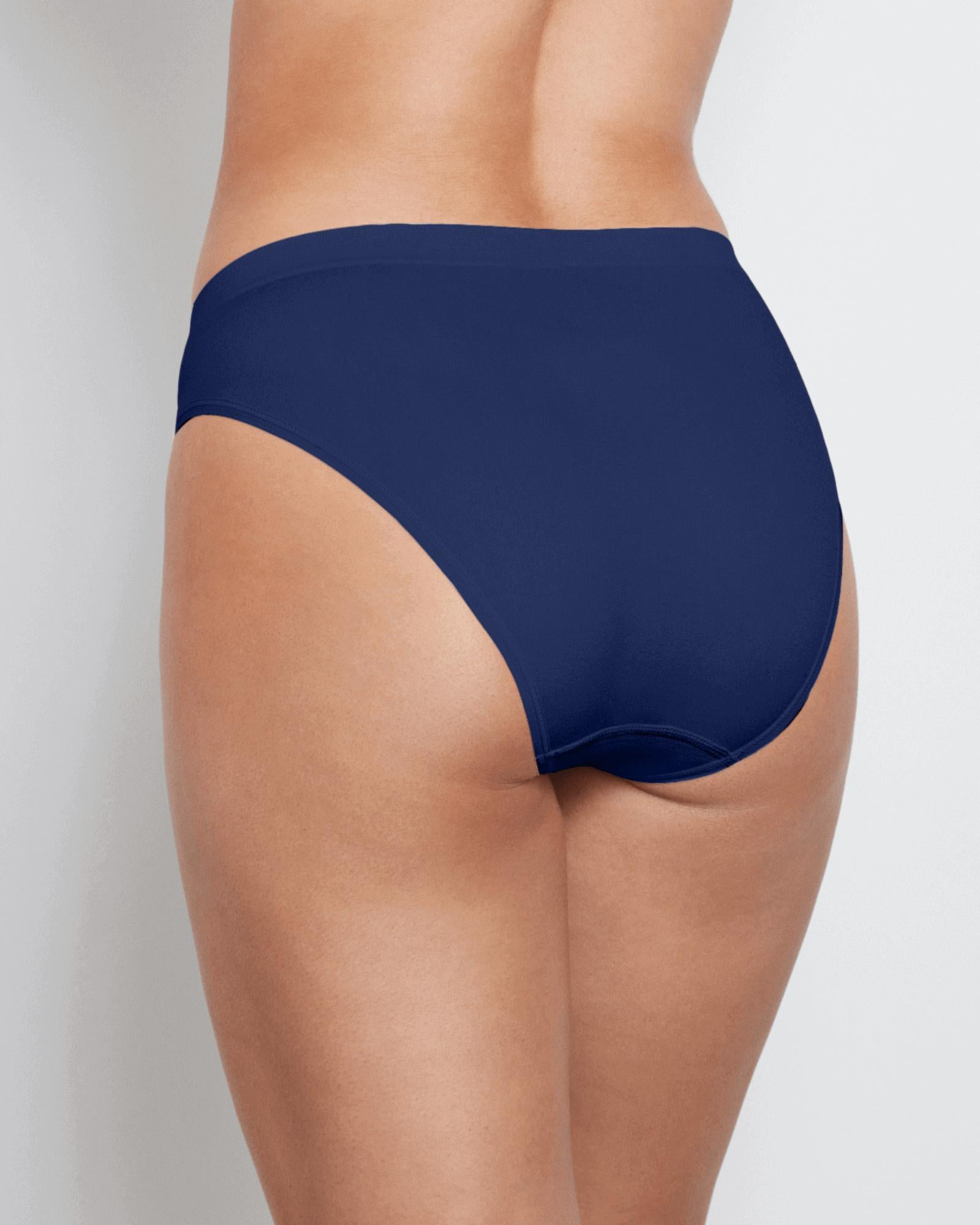 Model wears Seamless Soft High Cut Brief in Medieval Blue. On body back view