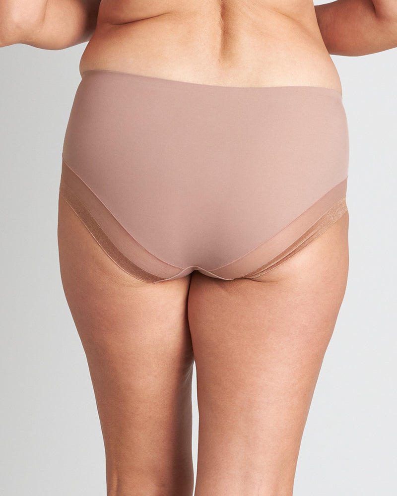 Model wears Comfit Collection Midi in MOCHA. On body back view