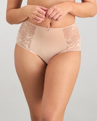 Model wears Embrace Full Brief in LATTE. On body front view