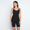 Model wears Medium Control Jumpsuit in BLACK. On body front view