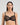 Model wears Sheer Essence Underwire Bra in BLACK. On body front view