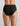 Model wears Extra-Ordinary Full Brief in BLACK. On body back view