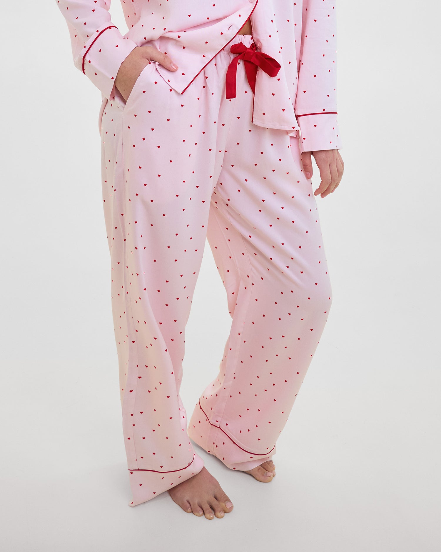 Model wears Hearts In Cabana Long Pj Pant in MINI HEART PRINT. On body front view