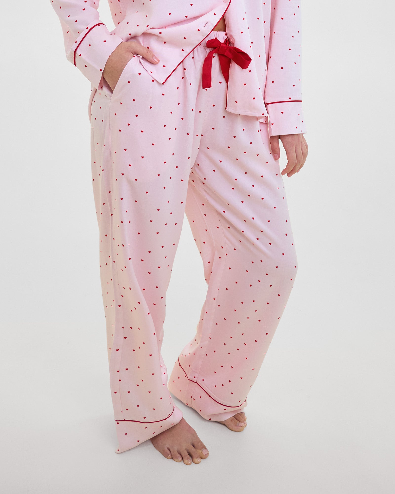 Model wears Hearts In Cabana Long Pj Pant in MINI HEART PRINT. On body front view